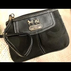 <SOLD> Black Coach wristlet with a strap
